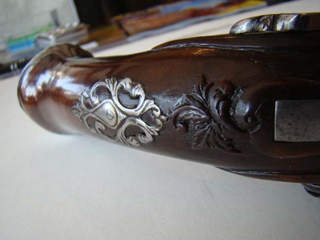 A pair of late 17th century Italian steel mounted flintlock officers' pistols circa 1695 — image 8